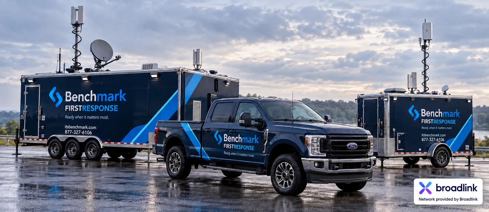 Benchmark FirstResponse truck, large mobile-network trailer, and smaller communications trailer with Broadlink network branding.